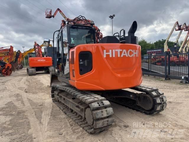 Hitachi ZX 135 US-6 Bandgrävare