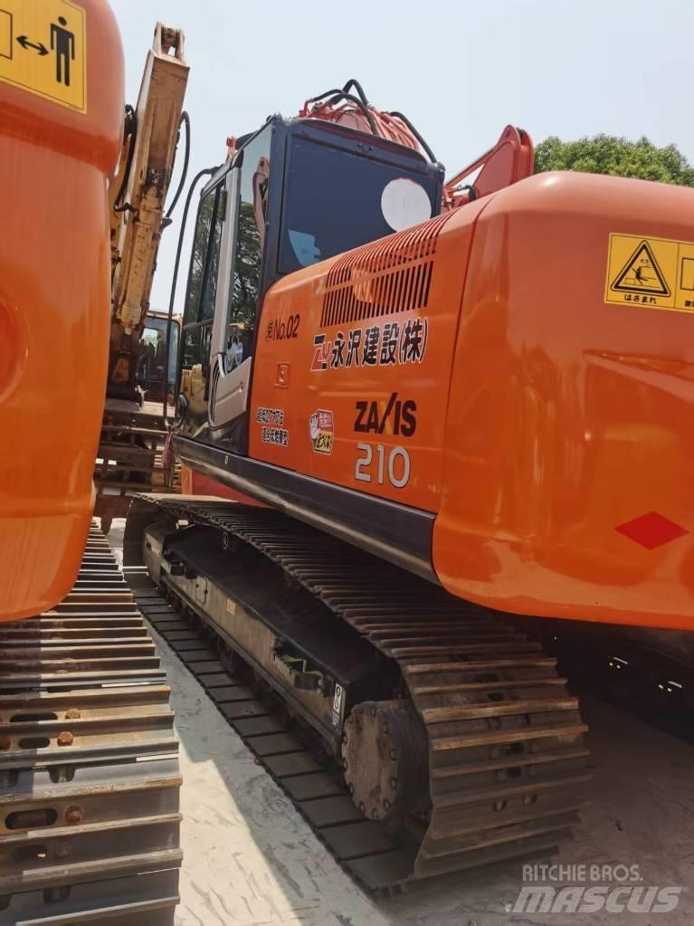 Hitachi ZX 210 Bandgrävare