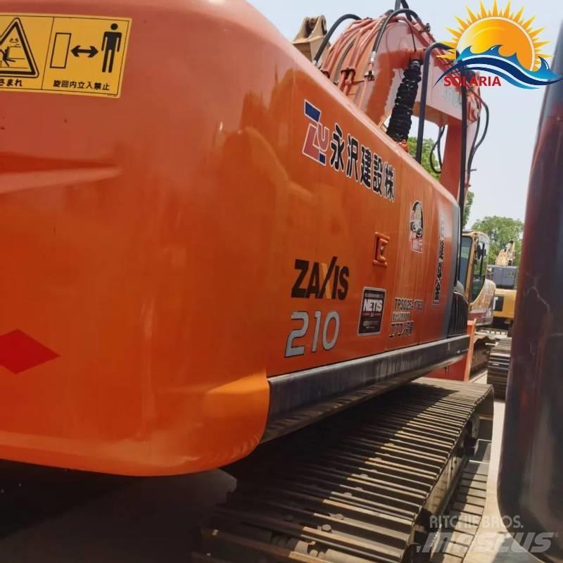 Hitachi ZX 210 Bandgrävare