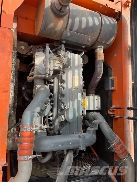Doosan DX 225 LC Bandgrävare