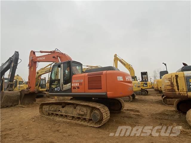 Hitachi ZX 210 Bandgrävare