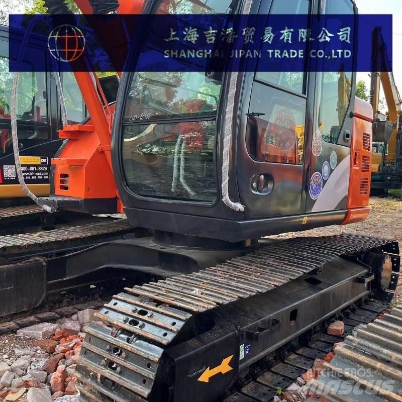 Hitachi ZX 135 Bandgrävare