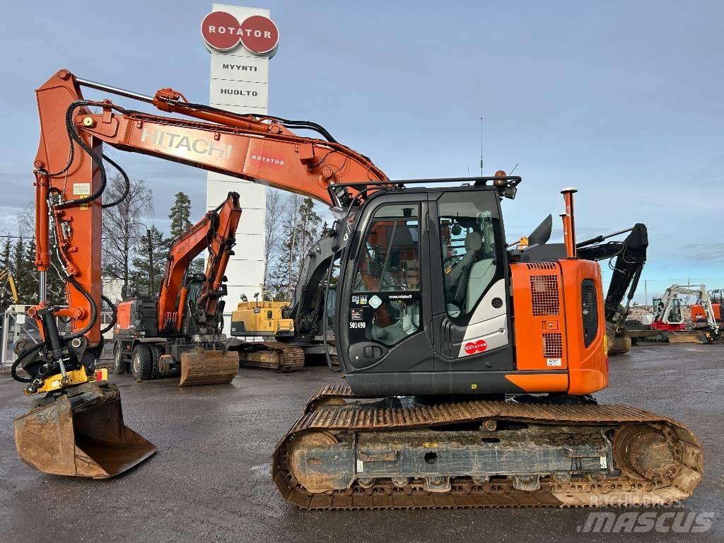 Hitachi ZX 135 US-6 Bandgrävare