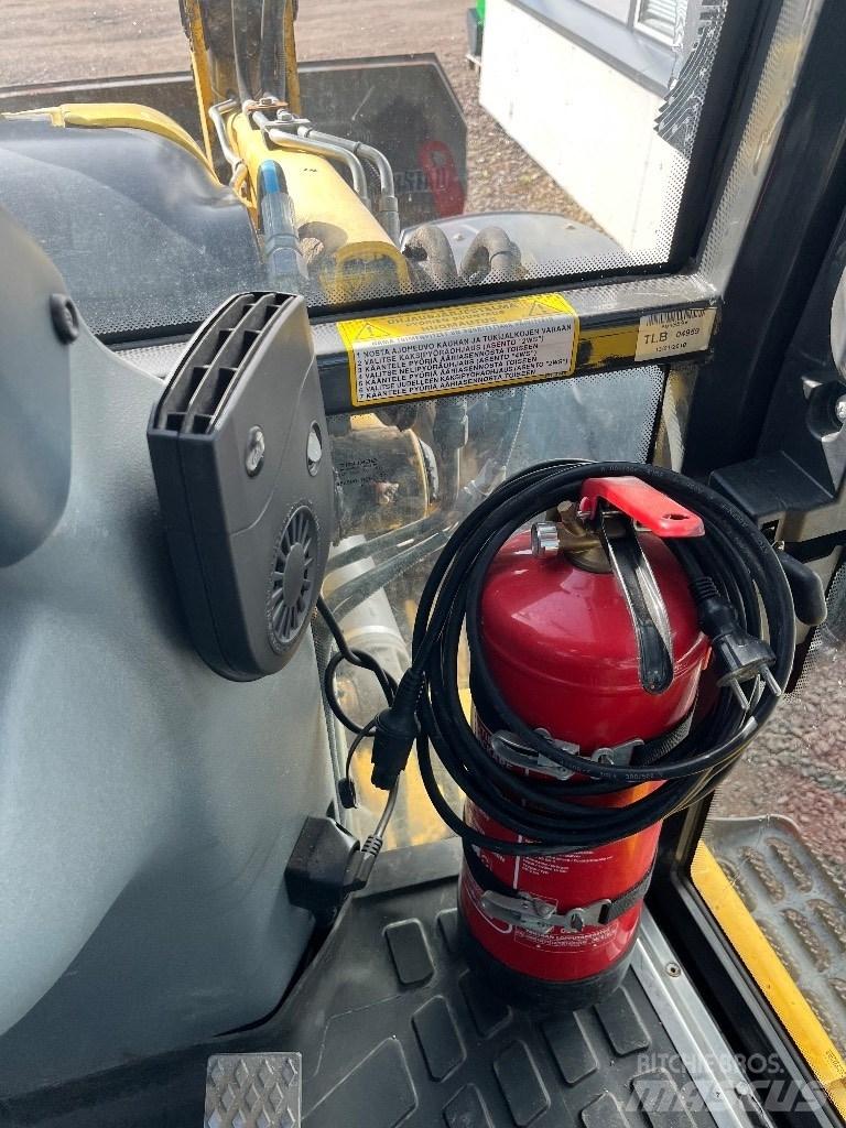 New Holland B 115 B Grävlastare