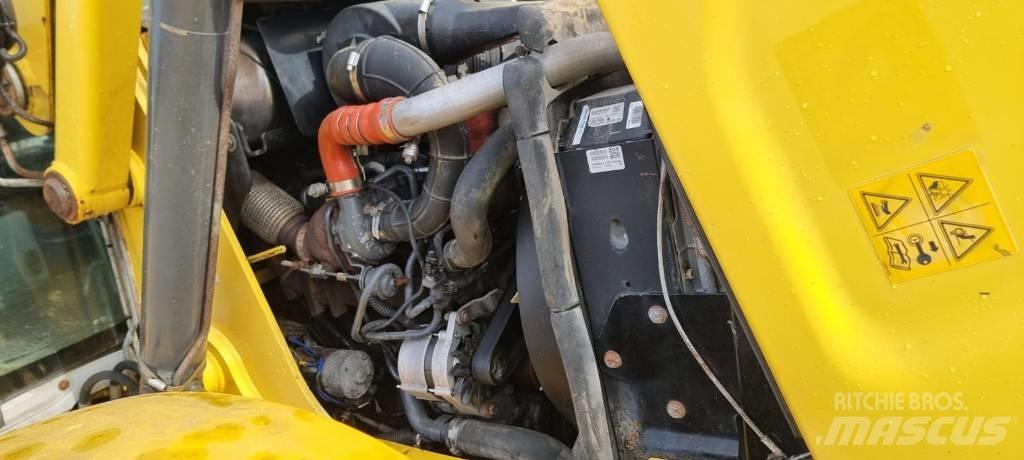 New Holland B 115 C Grävlastare
