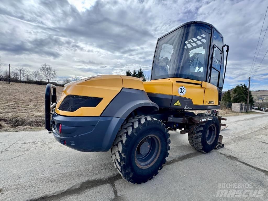 Mecalac 12 M TX Grävlastare