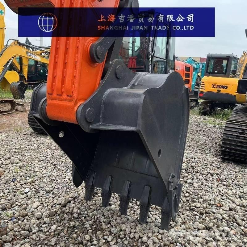Doosan DX 225 Bandgrävare
