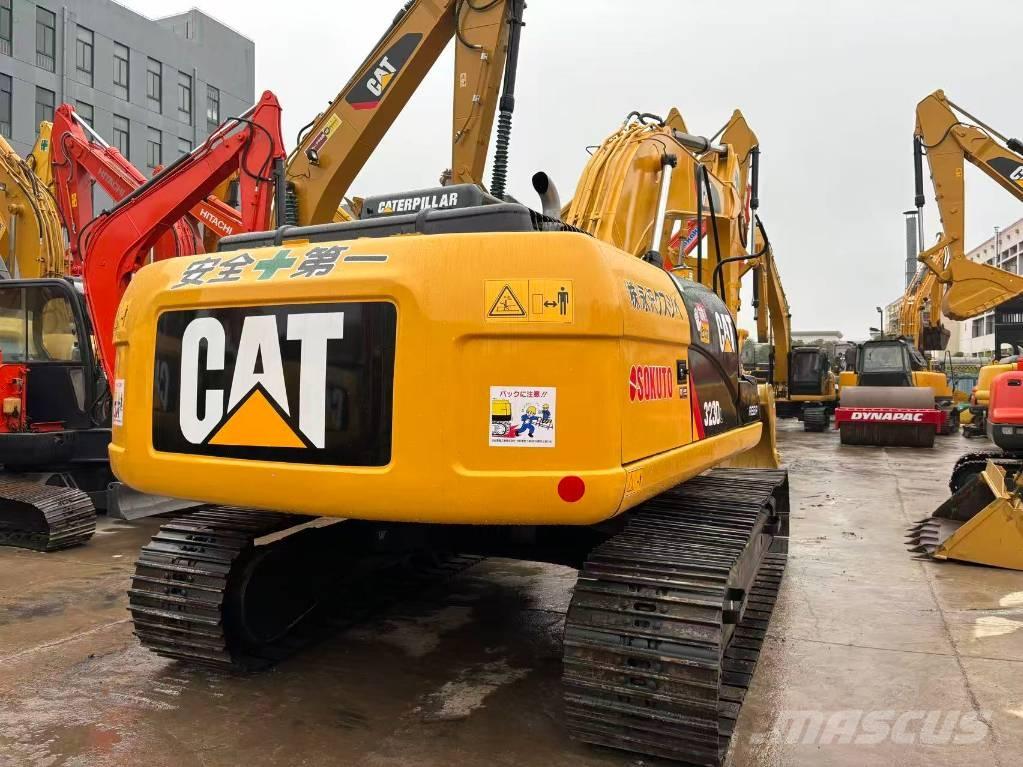 CAT 323 D L Bandgrävare