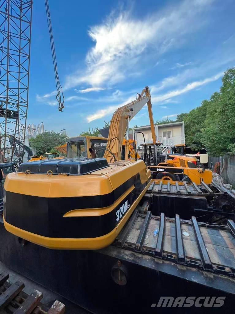 CAT 320BL Amfibiska grävmaskiner