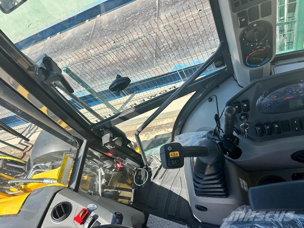 New Holland B 115 B Grävlastare