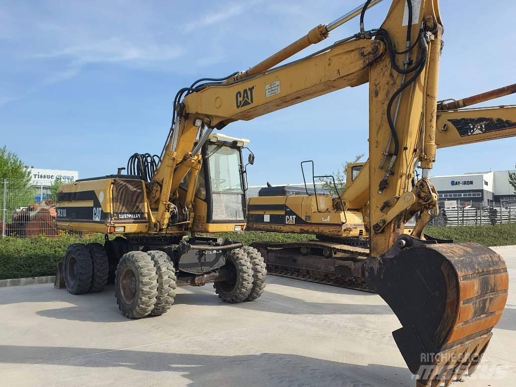 CAT M 318 Hjulgrävare