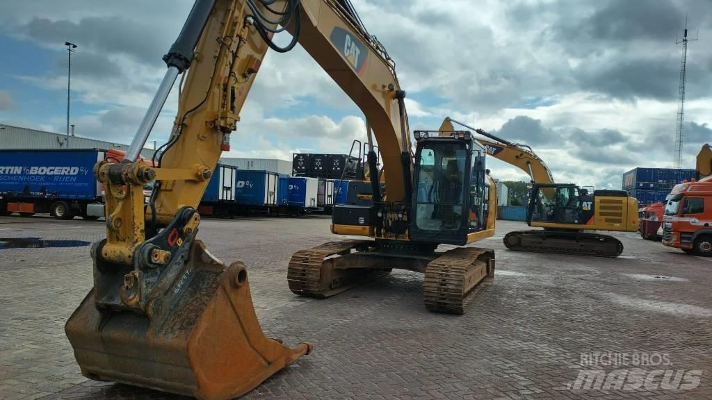 CAT 323 EL Bandgrävare