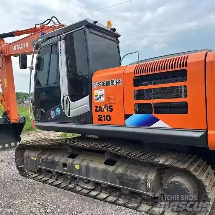 Hitachi ZX210 Bandgrävare