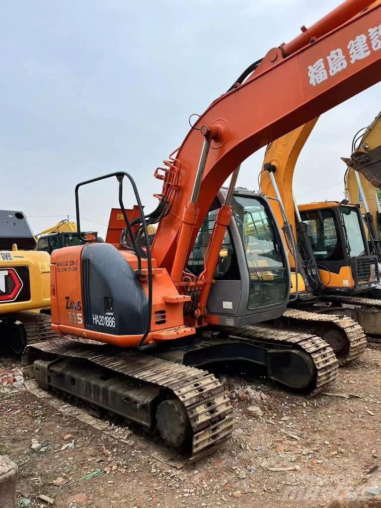 Hitachi ZX 135 US Bandgrävare