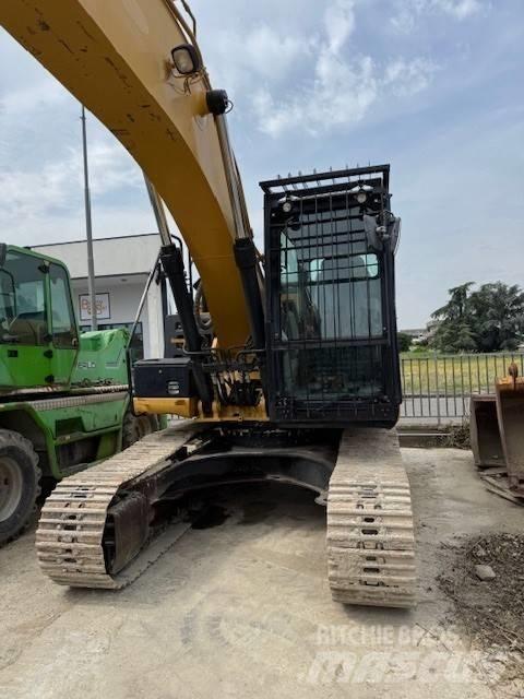 CAT 323 E Bandgrävare