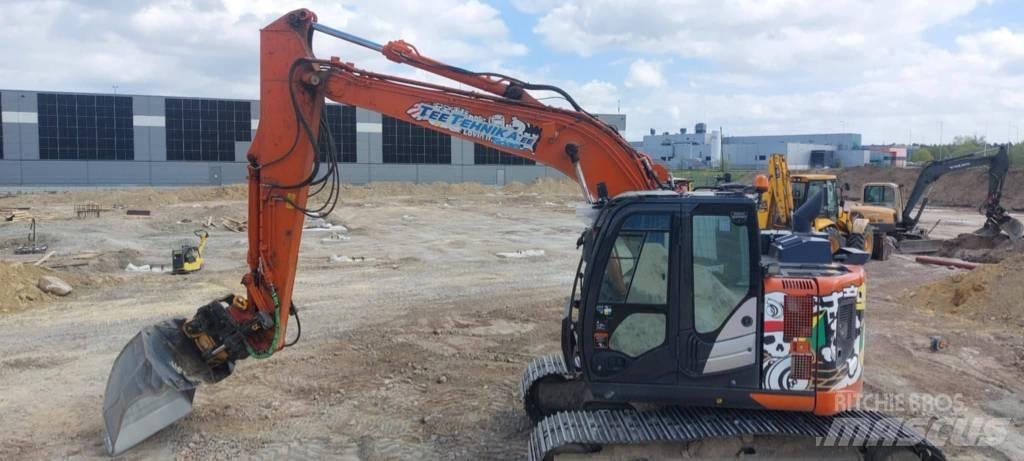 Hitachi ZX 135 US-6 Bandgrävare