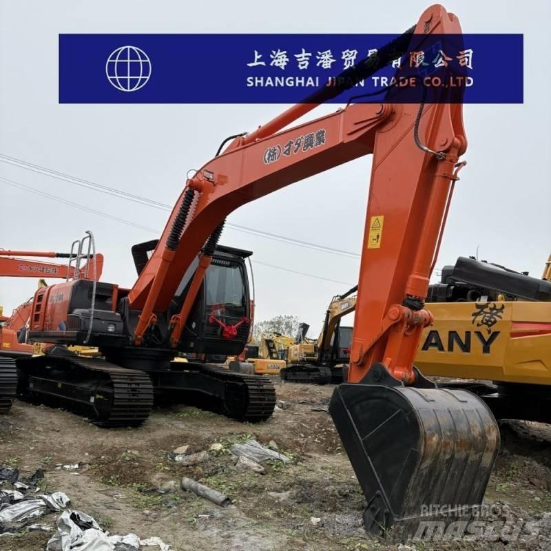 Hitachi ZX 210 Bandgrävare
