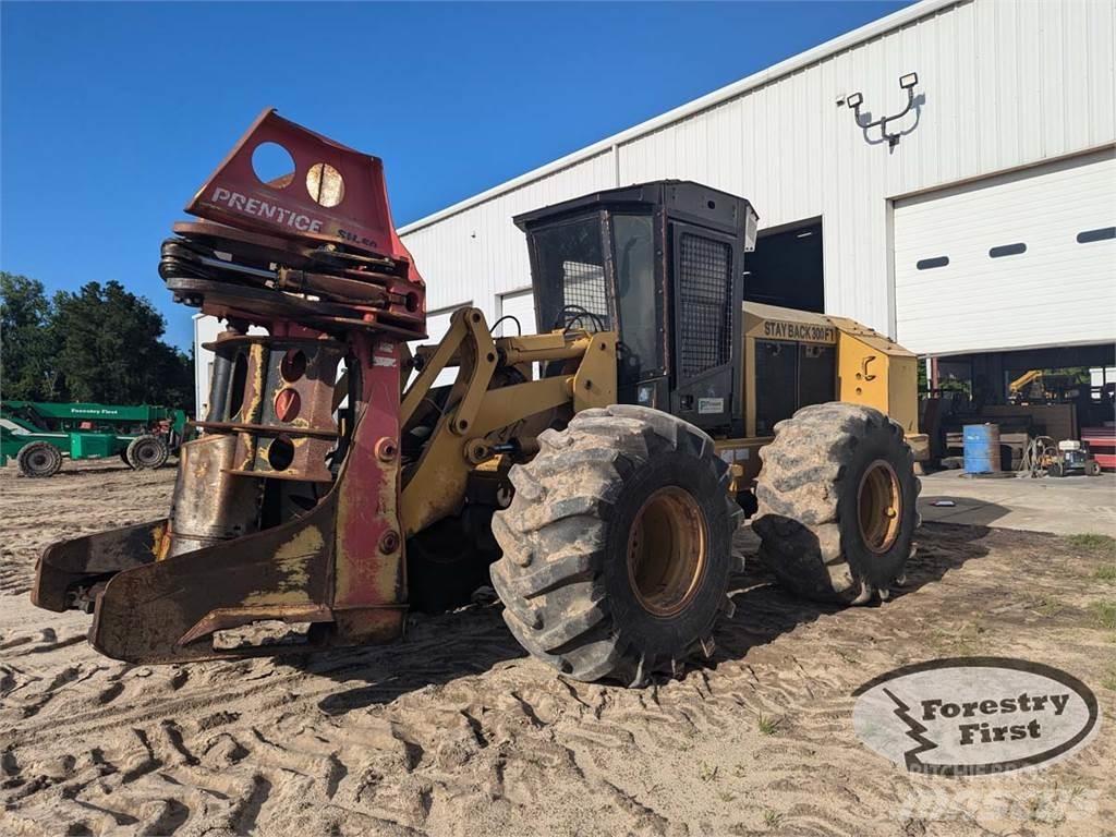 CAT 553 Fällare-läggare