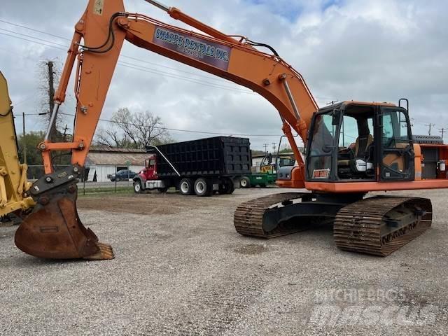 Doosan DX225LC Bandgrävare