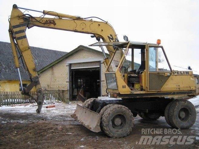 CAT 212 til ophug Bandgrävare