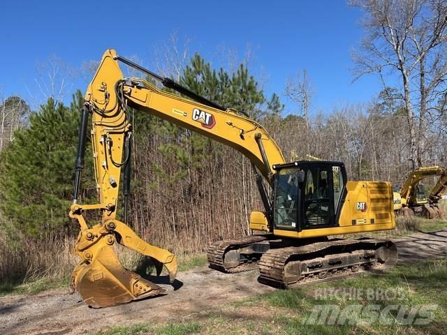 CAT 323 Bandgrävare