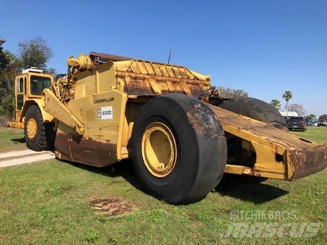 CAT 633D Schaktvagnar
