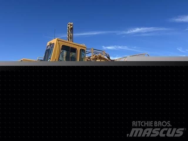 CAT 633E Schaktvagnar