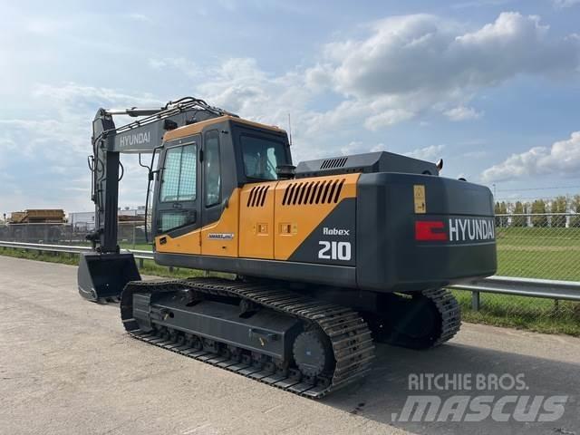 Hyundai R210 Bandgrävare