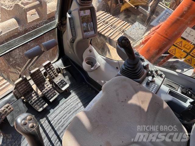 Hitachi ZX210-6 Bandgrävare