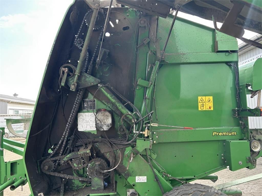 John Deere 864 Rundbalspressar