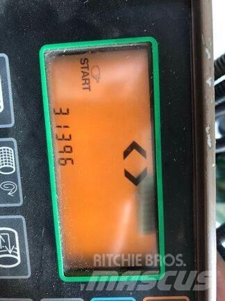John Deere 590 Rundbalspressar