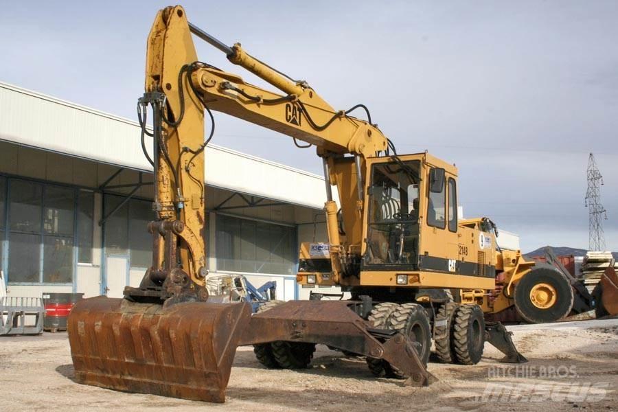CAT 214B Hjulgrävare