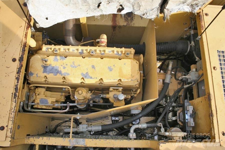 CAT 214B Hjulgrävare