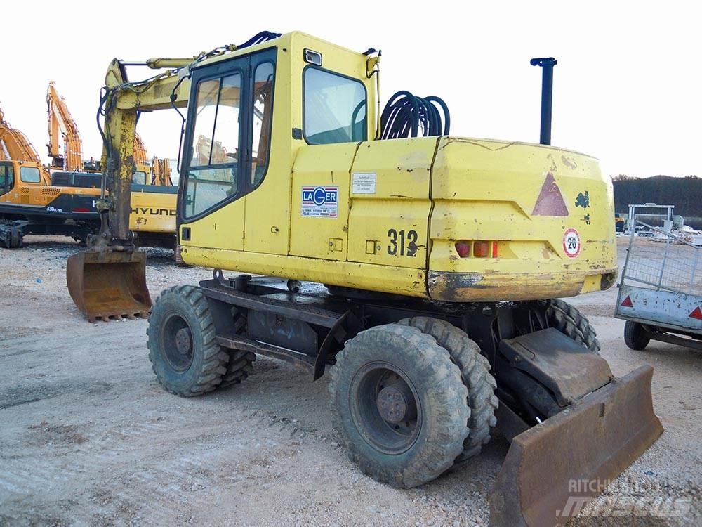 CAT M312 Hjulgrävare