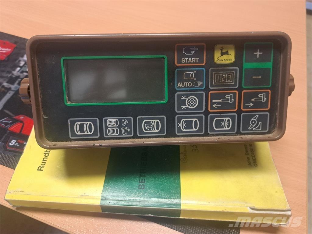 John Deere 570 Rundbalspressar