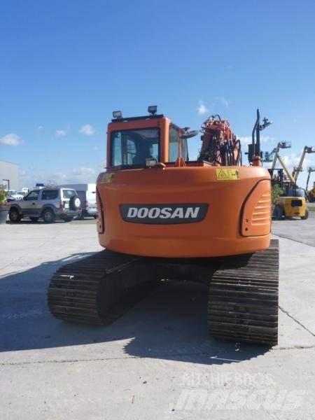 Doosan DX140LC Bandgrävare