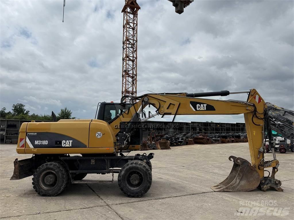 CAT M 318 D Hjulgrävare