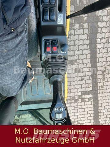 CAT MH 3022 Hjulgrävare