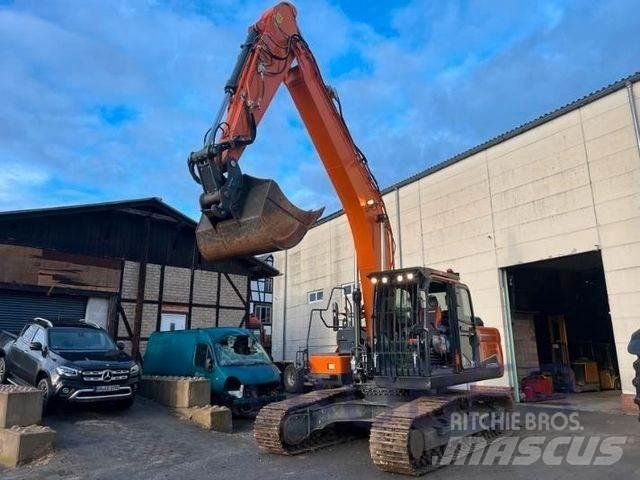 Doosan DX 225 LC-5 Bandgrävare