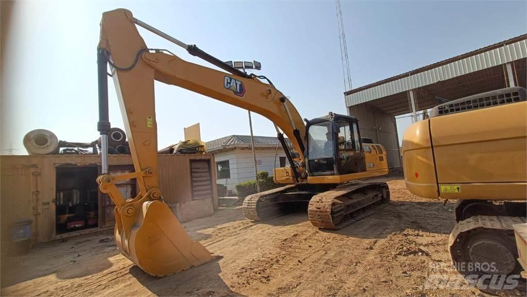 CAT 323D3 Bandgrävare