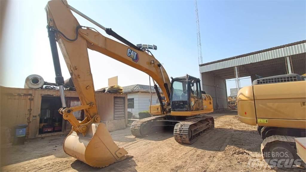 CAT 323D3 Bandgrävare