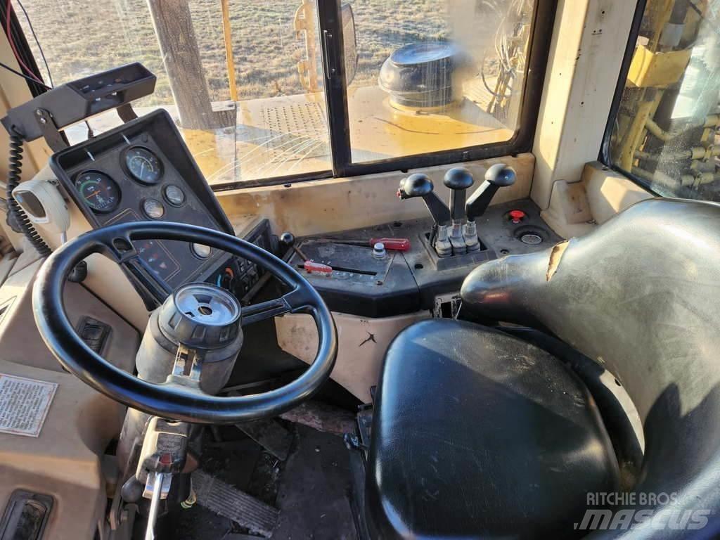 CAT 621F Schaktvagnar