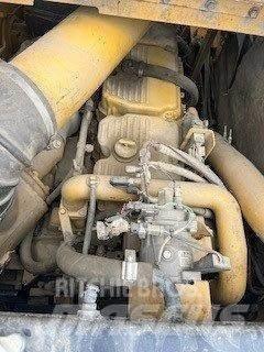 CAT 621G Schaktvagnar
