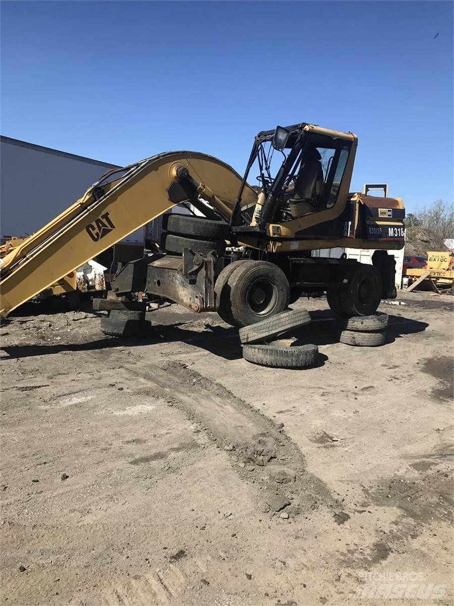 CAT M318 Hjulgrävare