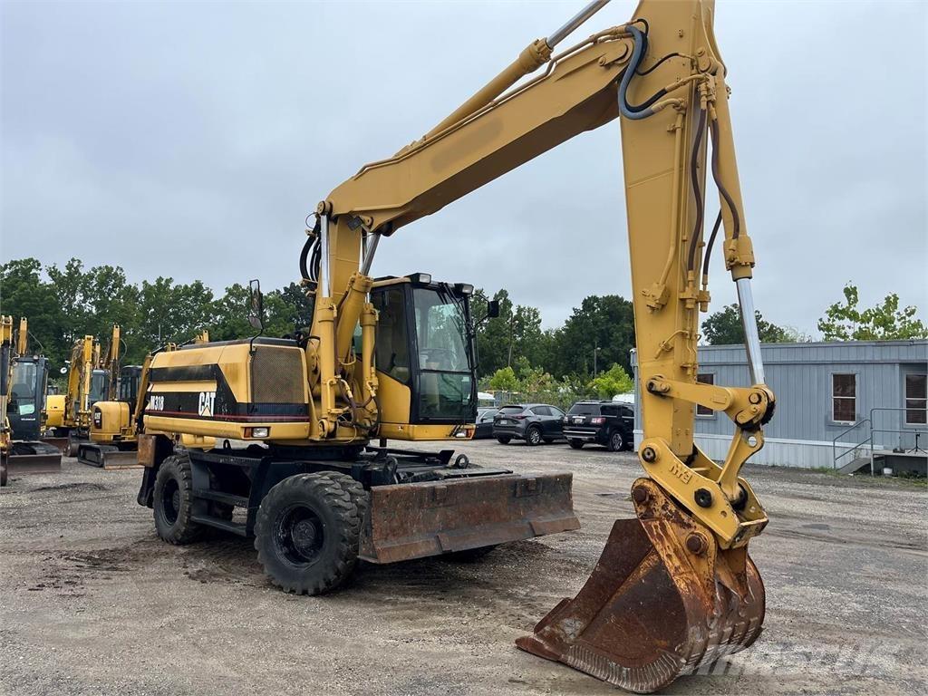 CAT M318 Hjulgrävare