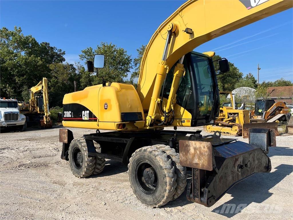 CAT M318C Hjulgrävare