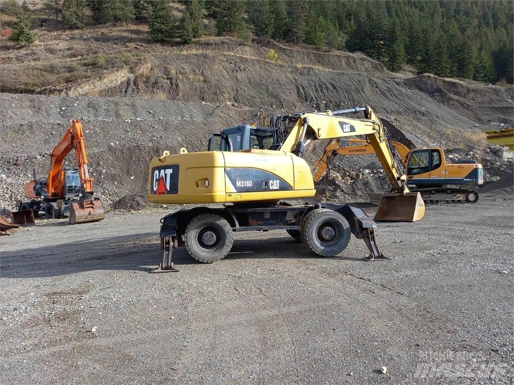 CAT M318D Bandgrävare