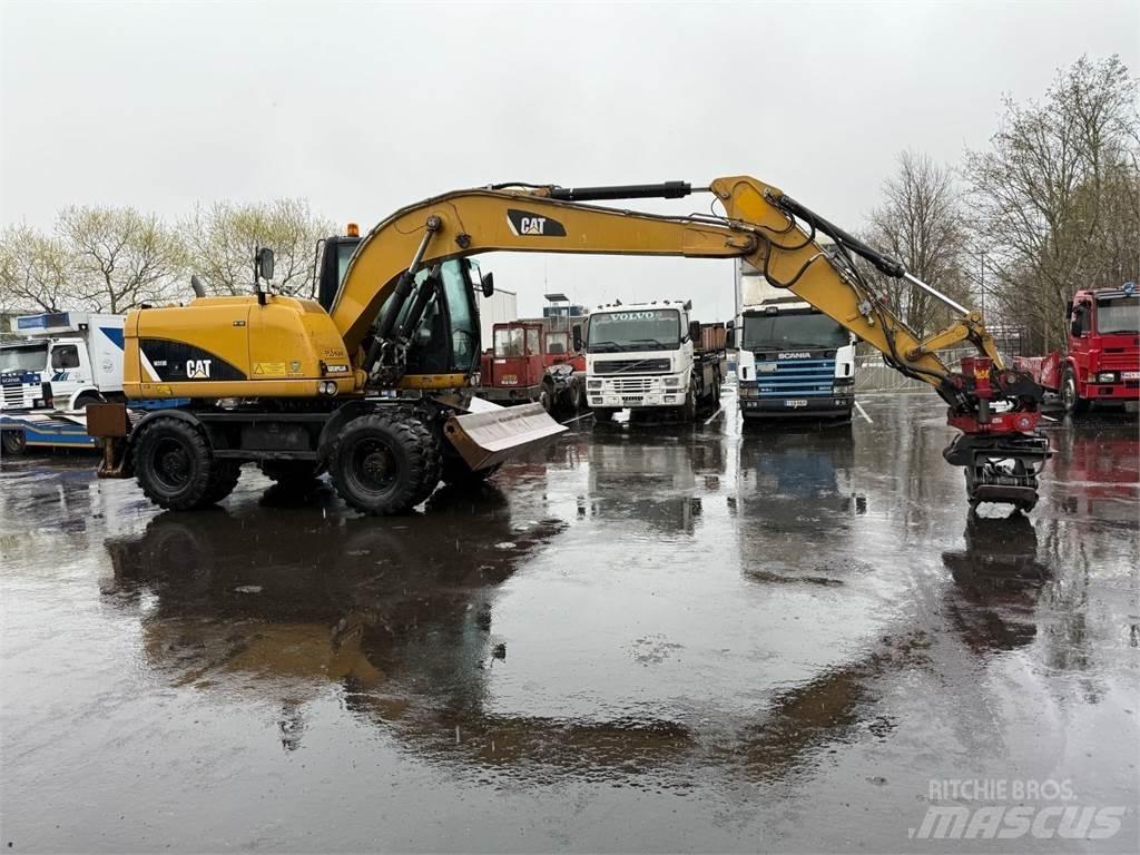 CAT M313 D Hjulgrävare