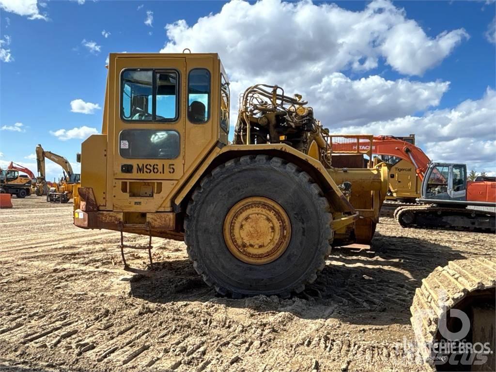 CAT 621G Schaktvagnar