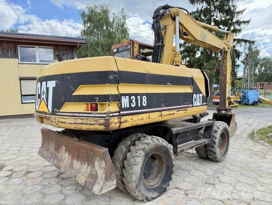 CAT M318 Hjulgrävare